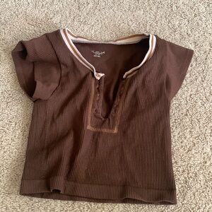 Urban Outfitters brown out from under top.